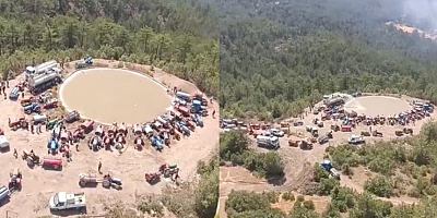 Tankerlerle su taşıyan vatandaşlar helikopterleri susuz bırakmadı